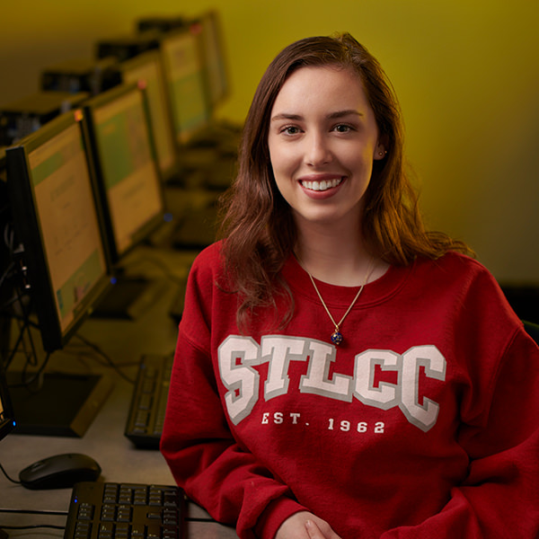 female stlcc student in computer lab