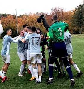 STLCC soccer players celebrate Central District title win