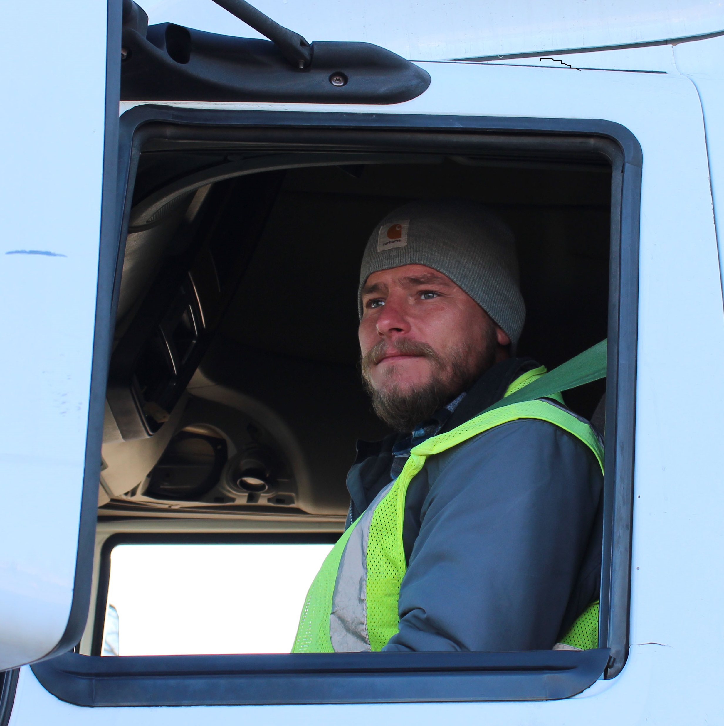 Jason Clark in the cab of a truck at STLCC-Forest Park. 