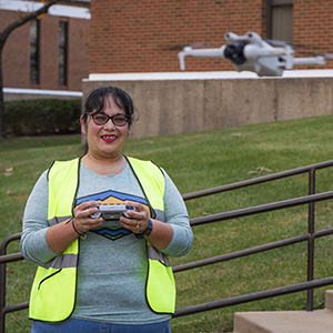 Student operating a drone during hands-on drone pilot training