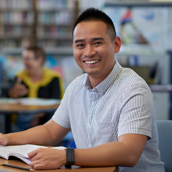 man in library