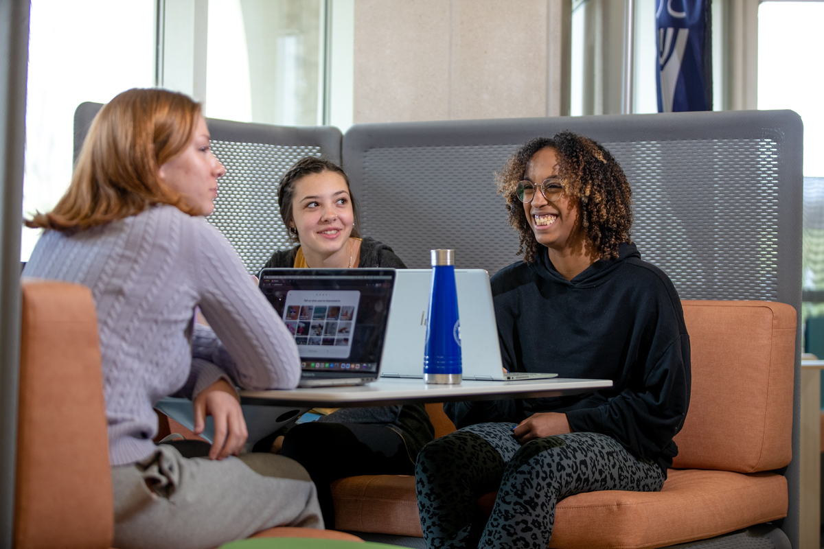students studying on campus