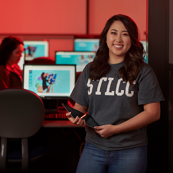 high school aged student taking college courses on an STLCC campus